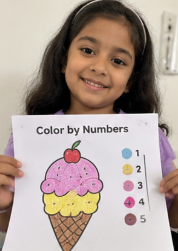 A child doing Mamapick worksheets